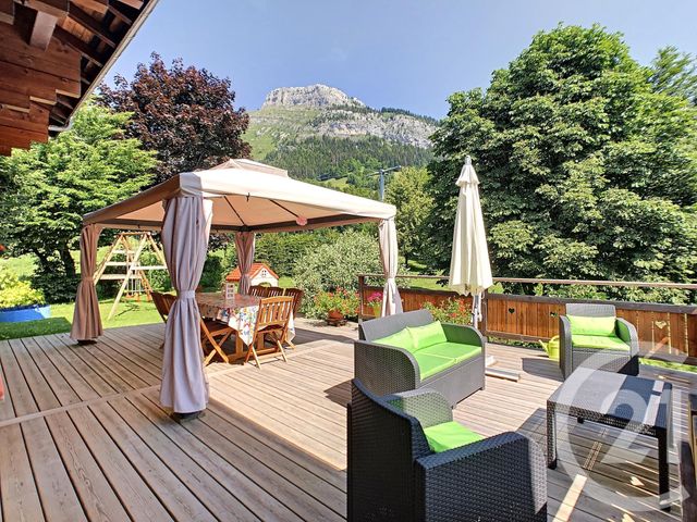 Afficher la photo en grand maison à vendre - 6 pièces - 252.0 m2 - LE GRAND BORNAND - 74 - RHONE-ALPES - Century 21 Aravis Immobilier